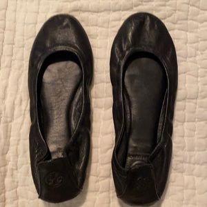 Black Tory Burch flats.